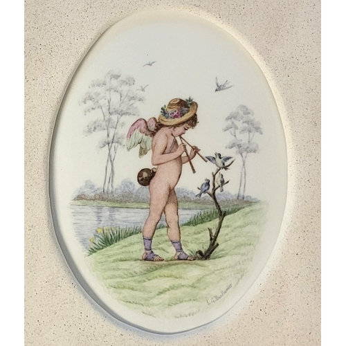 280 - LUCIEN BOULLEMIER FOR MINTON, A PAIR OF OVAL PORCELAIN PLAQUES
Polychrome enamelled with cherubs, on... 