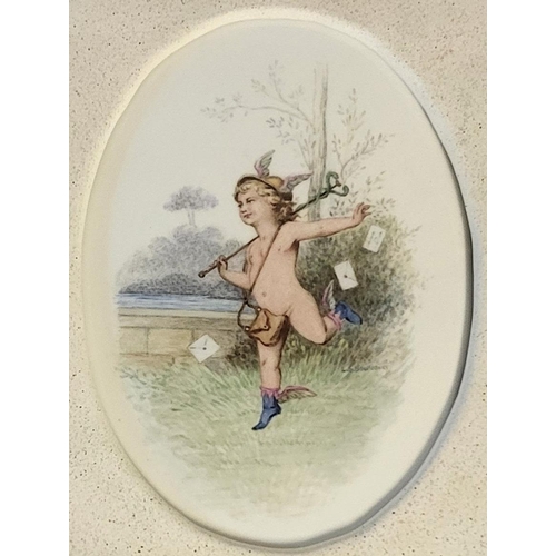 280 - LUCIEN BOULLEMIER FOR MINTON, A PAIR OF OVAL PORCELAIN PLAQUES
Polychrome enamelled with cherubs, on... 