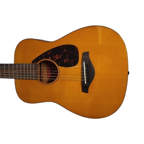 169A - YAMAHA, A VINTAGE FG JUNIOR ACOUSTIC GUITAR
Having a faux tortoise shell guard, bearing label ‘Yamah... 