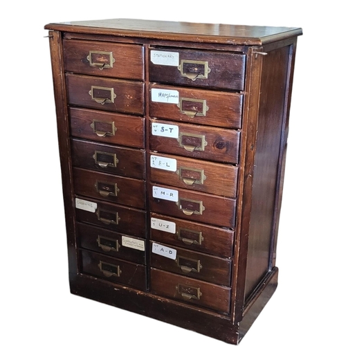 529 - AN EARLY 20TH CENTURY STAINED PINE FLOOR STANDING COLLECTOR’S CHEST
Having an arrangement of sixteen... 