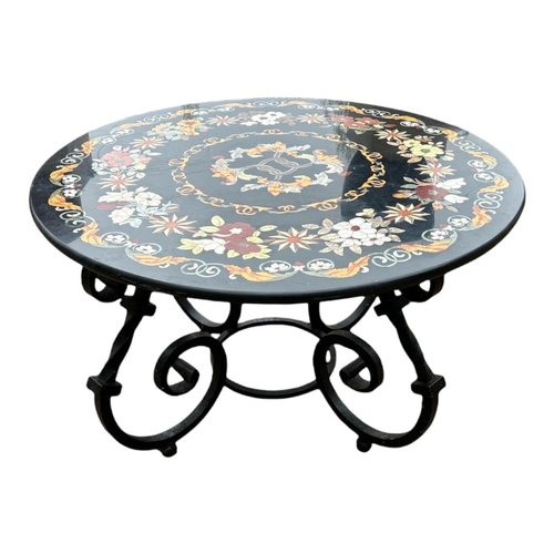 543 - A 20TH CENTURY PETRA DURA SPECIMEN MARBLE FLORAL INLAID DINING TABLE 
On heavy decorative scrollwork... 