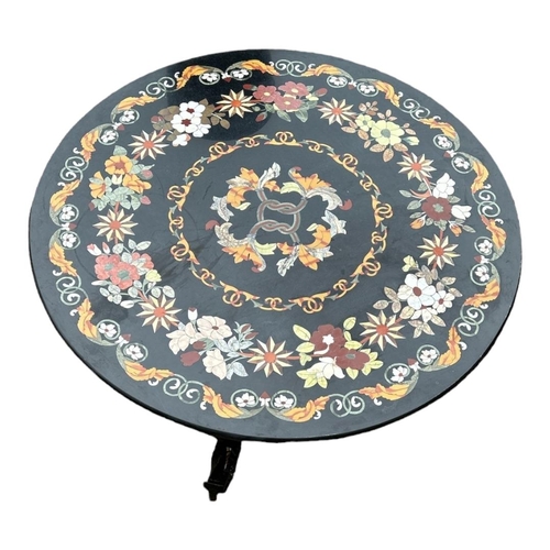 543 - A 20TH CENTURY PETRA DURA SPECIMEN MARBLE FLORAL INLAID DINING TABLE 
On heavy decorative scrollwork... 