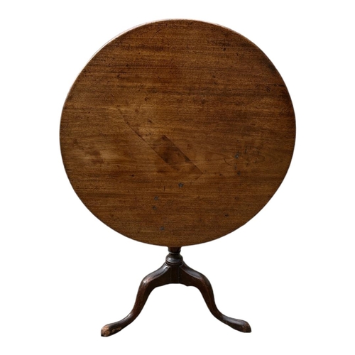 536 - A 19TH CENTURY MAHOGANY TILT TOP SUPPER TABLE
The single piece circular top on bulbous column with t... 