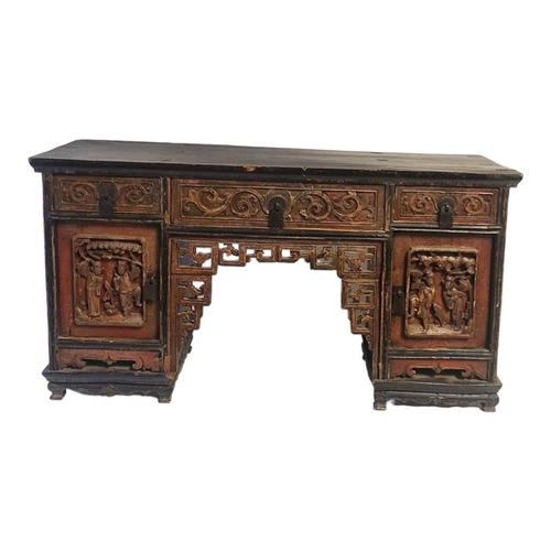 549 - A CHINESE EXPORT QING DYNASTY HARDWOOD NOVELTY PARTNER’S PEDESTAL DESK
Having an arrangement of thre... 