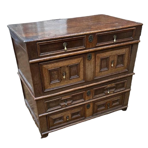 555 - A JAMES II PERIOD OAK CHEST OF DRAWERS
Fitted with brass teardrop handles.
(63cm x 105cm x 92cm)

Co... 