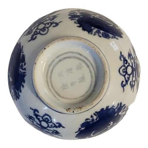 340 - A 19TH CENTURY CHINESE STYLE  BLUE AND WHITE FOOTED BOWL
With entwined phoenix and lotus decoration,... 