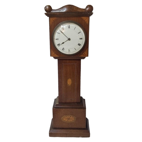 353 - AN EDWARDIAN MAHOGANY MINIATURE LONGCASE CLOCK
Having Sheraton revival inlaid shell and stringing, c... 