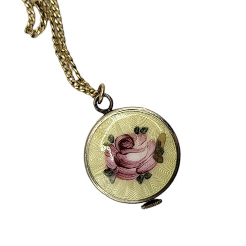 146 - A VINTAGE YELLOW METAL AND GUILLOCHÈ ENAMEL PENDANT WATCH
Rose tone dial with enamel pink rose on ye... 