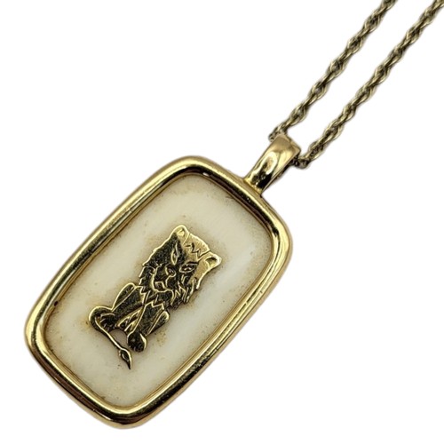 150 - A VINTAGE 18CT GOLD 'LION 'PENDANT
Rectangular form with applied lion on a fine link 14ct gold neckl... 