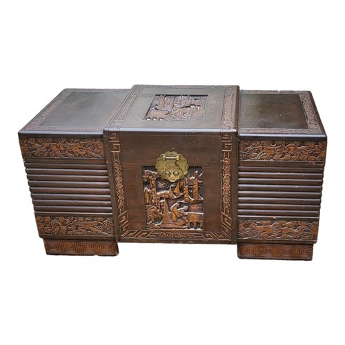 588 - A MID 20TH CENTURY CHINESE CARVED CAMPHOR CHEST.
(95cm x 46cm x 48cm)

Condition: good, some light m... 