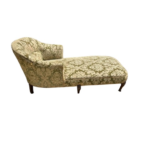 586 - A VICTORIAN CHAISE LONGUE
With olive green brocade upholstery, raised on carved mahogany claw and ba... 