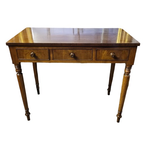 585 - A VICTORIAN MAHOGANY SIDE TABLE
With three drawers, on turned legs.
(89cm x 49cm x 74cm)

Condition:... 