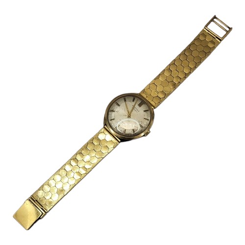 26A - MISTAS, A VINTAGE 9CT GOLD GENT’S WATCH ON 18CT GOLD STRAP
Marked number ‘3020’ to case, on honeycom... 