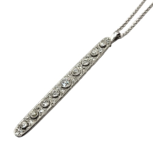 29A - AN ART DECO WHITE METAL AND DIAMOND PENDANT NECKLACE
Having a row of graduated round cut diamonds wi... 