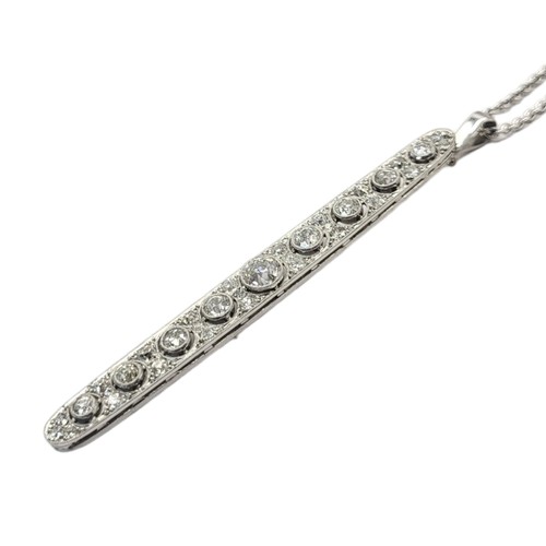 29A - AN ART DECO WHITE METAL AND DIAMOND PENDANT NECKLACE
Having a row of graduated round cut diamonds wi... 