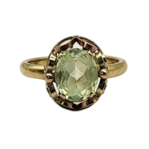 34A - A VINTAGE YELLOW METAL AND PERIDOT RING
The oval faceted stone set in a pierced design.
(size N)
Tes... 