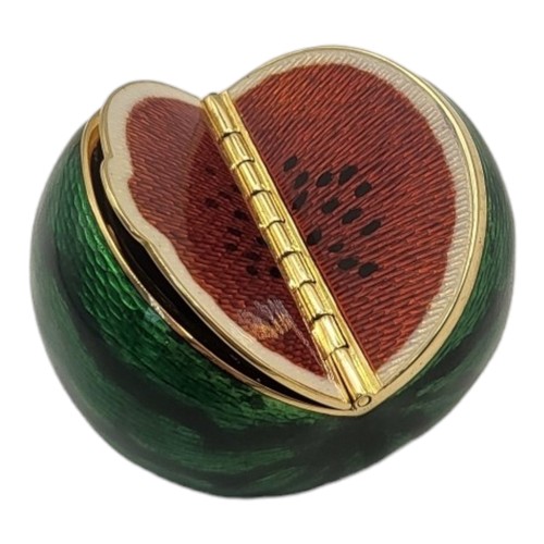 35A - A RARE AND UNUSUAL CONTINENTAL 18CT GOLD AND GUILLOCHE ENAMEL 'MELON' PILL BOX
Having a hinged compa... 