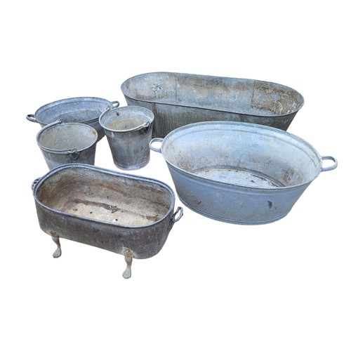 591 - A VINTAGE GALVANISED BATH
Along with two large basins,three buckets and a regency style copper and p... 