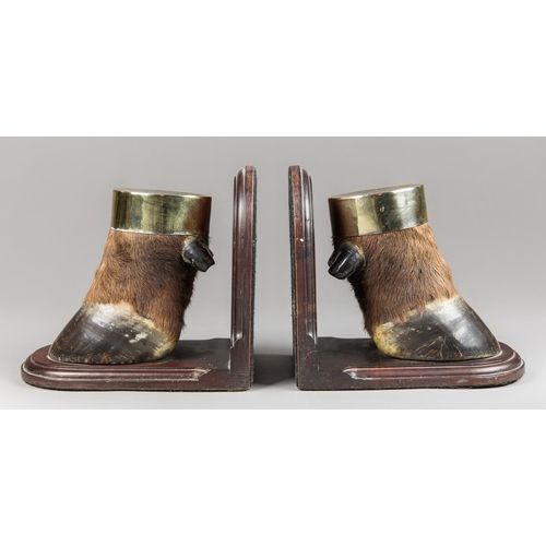 32 - A PAIR OF TAXIDERMY CAPE BUFFALO FOOT BOOKENDS (SYNCERUS CAFFER).
(h 33cm x w 25cm x d 17cm)