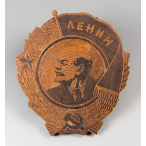 363 - AN EARLY 20TH CENTURY RUSSIAN VLADIMIR LENIN CARVED & INLAID PORTRAIT PLAQUE.
(h 35cm x w 31cm x d 3... 