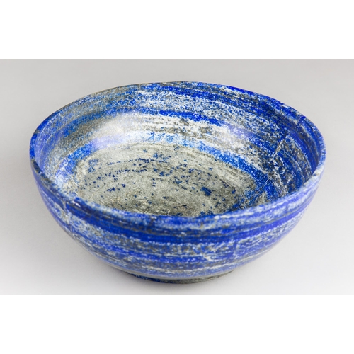 369 - A LARGE LAPIS LAZULI BOWL.
(h 10.5cm x w 25.5cm x d 25.5cm)