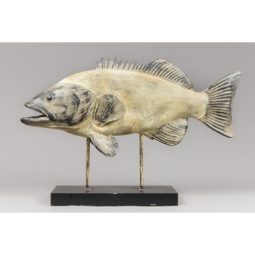 375 - A LARGE DECORATIVE WOOD EFFECT FISH MOUNTED ON A DISPLAY STAND.
(h 42cm x w 63cm)