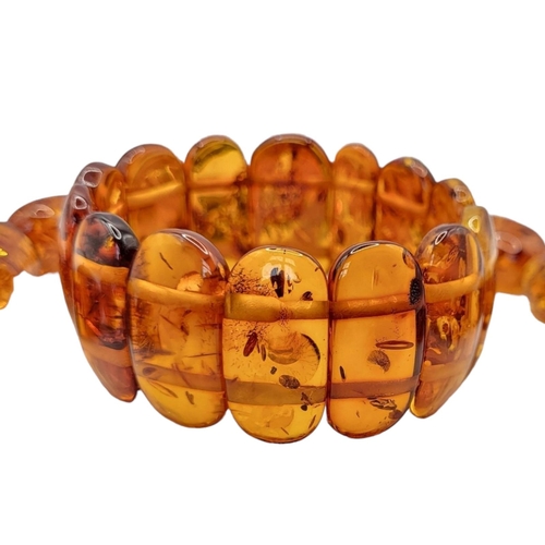 30 - A VINTAGE BALTIC AMBER NECKLACE AND BRACELET
Graduated beads with Continental silver clasp, together... 