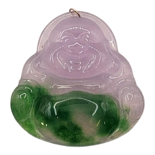 45 - AN ORIENTAL TWO-TONE JADEITE SMILING BUDDHA PENDANT
Translucent spinach green and purple colouring w... 
