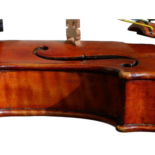 348 - AN EARLY MID 19TH CENTURY FRENCH VIOLIN
Indecipherable internal label, colour, orange oily, one piec... 