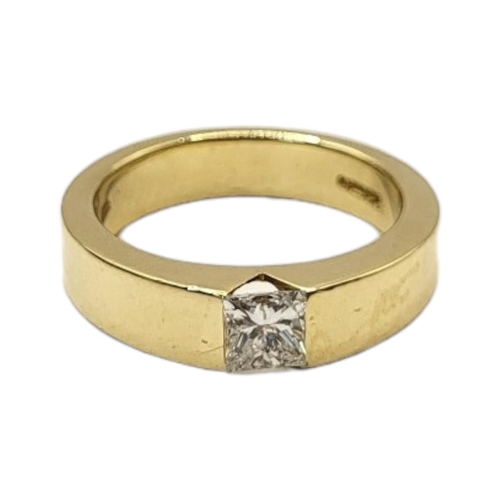 45A - MAPPIN AND WEBB, AN 18CT GOLD AND DIAMOND SOLITAIRE RING
The single Princess cut stone in a rub over... 
