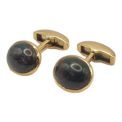 46A - ASPREY, A PAIR OF 9CT GOLD AND BLOODSTONE GENT’S CUFFLINKS
Each set with a cabochon cut stone in a c... 