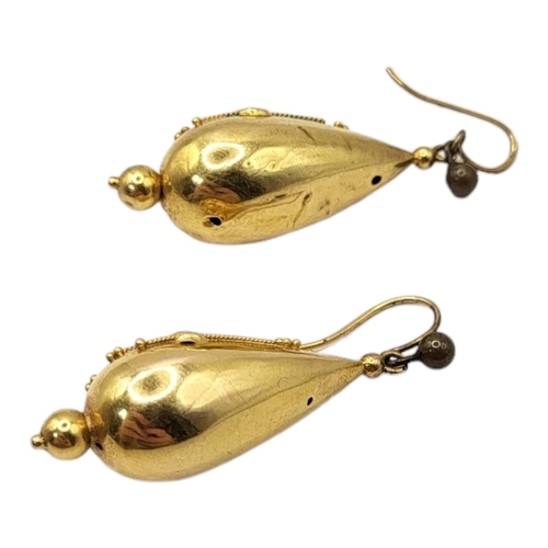 55A - A PAIR OF 19TH CENTURY ETRUSCAN YELLOW METAL DROP EARRINGS
Pear form with applied decoration.
(appro... 