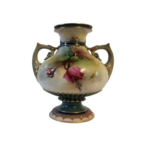 102A - AN EDWARDIAN ROYAL WORCESTER BONE CHINA TWIN HANDLED VASE
Modelled by James Hadley, Circa 1909, poly... 
