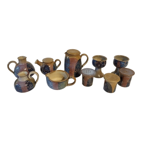 103 - CRICH POTTERY, DERBYSHIRE, A COLLECTION OF TEN KITCHENWARE STONEWARE ITEMS 
To include three coffee/... 
