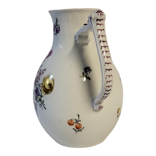 129 - ATTRIBUTED TO 18TH CENTURY HOCHST OR FULDA FACTORY, CIRCA 1770, A HARD PASTE PORCELAIN PEAR FORM JUG... 