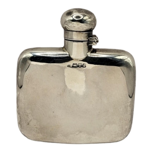 24 - A MID EDWARDIAN HALLMARKED SILVER MOUNTED HIP FLASK OF PLAIN DESIGN
Marked for Chester, 1905.
(10cm ... 