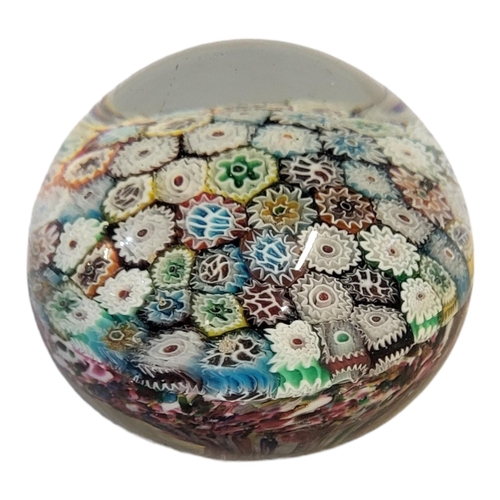 250 - A BACCARAT STYLE CONCENTRIC CLOSE PACK MILLEFIORI PAPERWEIGHT
With a variety of colourful canes.
(di... 