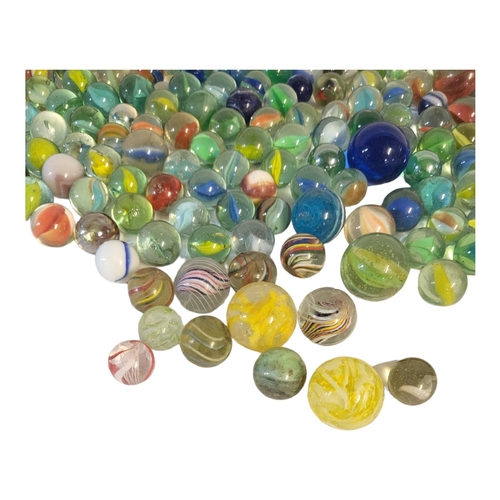 250A - A GLASS MARBLES, A LARGE MIXED COLLECTION OF OVER 300 PIECES OF VARIOUS GLASS MARBLES 
Including som... 
