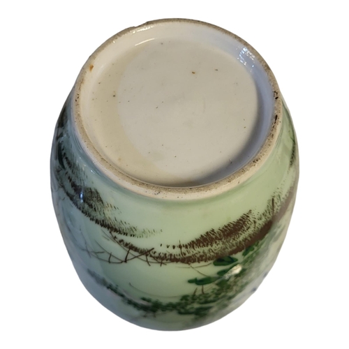 498 - A CHINESE LATE QING DYNASTY CELADON GLAZED BALUSTER VASE
With everted rim applied with raised decora... 