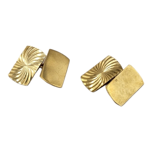 49A - A PAIR OF VINTAGE 9CT GOLD GENT’S CUFFLINKS
Rectangular form with engraved decoration.

Condition: g... 