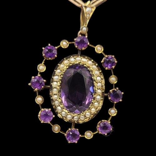 4A - AN EARLY 20TH CENTURY 9CT GOLD, AMETHYST AND SEED PEARL PENDANT NECKLACE
The oval cut faceted stone ... 