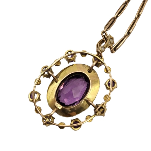 4A - AN EARLY 20TH CENTURY 9CT GOLD, AMETHYST AND SEED PEARL PENDANT NECKLACE
The oval cut faceted stone ... 