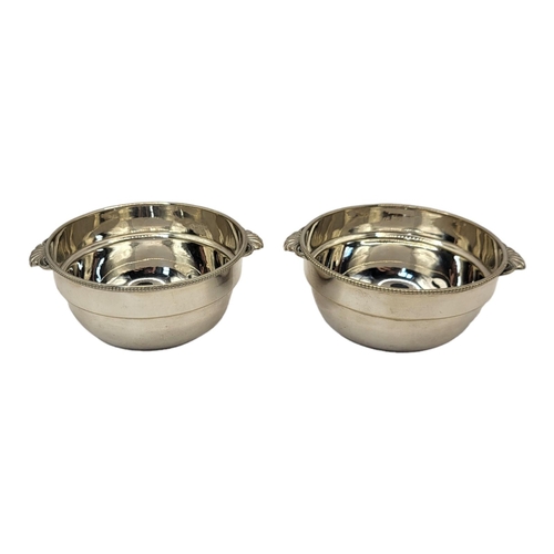 57A - CHRISTOFLE, A VINTAGE FRENCH  PAIR OF WHITE METAL BOWLS
Having twin handles and beaded edge.
(approx... 