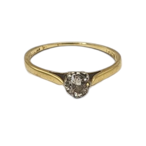 70 - AN EARLY 20TH CENTURY 18CT GOLD AND DIAMOND SOLITAIRE RING
Single round cut diamond in plain form mo... 
