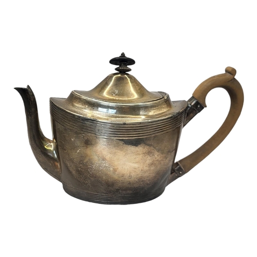 73 - A GEORGE III HALLMARKED SILVER TEAPOT BY PETER ANN BATEMAN, 1790 - 1799
Marked for London, 1978, of ... 
