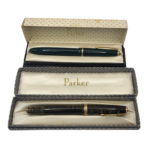 86 - PARKER, TWO EARLY 20TH CENTURY FOUNTAIN PENS
A green lacquer Duofold and a pen with brown marbled ca... 