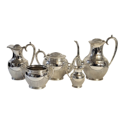 89 - A VICTORIAN SILVER PLATED FIVE PIECE TEA AND COFFEE SET
Comprising a teapot, coffee pot, hot water j... 