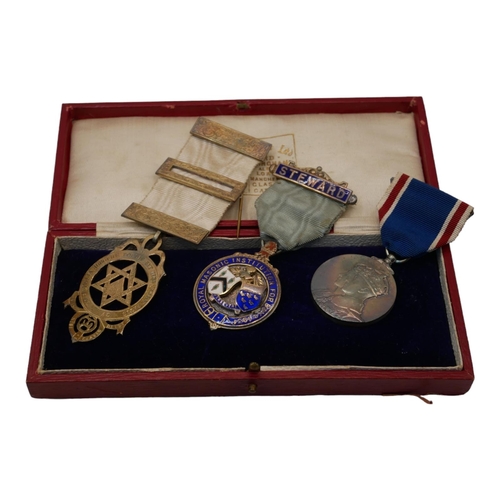 91 - A COLLECTION OF THREE EARLY 20TH CENTURY SILVER MASONIC MEDALS 
To include a pierced Star of Davi an... 