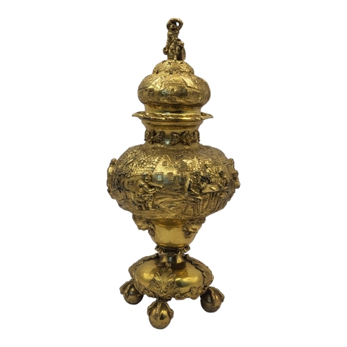 92 - GEORGE FOX, A LARGE EARLY 20TH CENTURY SILVER GILT SUGAR CASTOR
Having a figural finial to pierced d... 