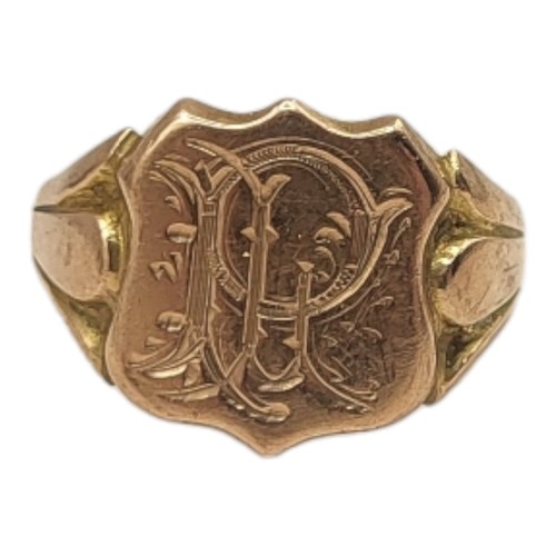 83A - AN EDWARDIAN 9CT GOLD GENT’S SIGNET RING
Having a shield finial and engraved initials.
(size R)

Con... 